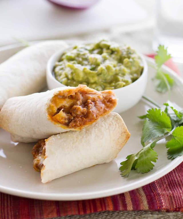 Baked Mexican Egg Rolls with Enchilada Guacamole Punchfork