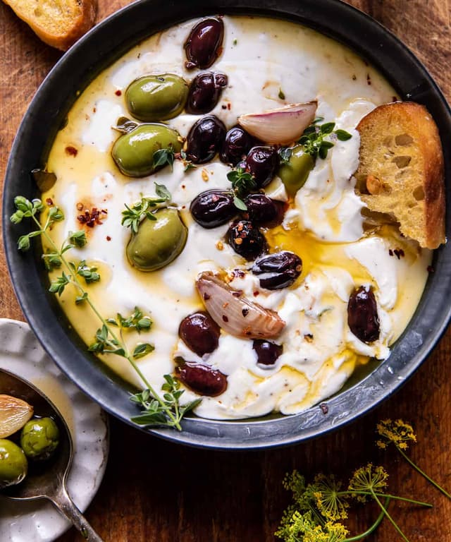 Honey Whipped Feta with Garlic Herb Roasted Olives Punchfork