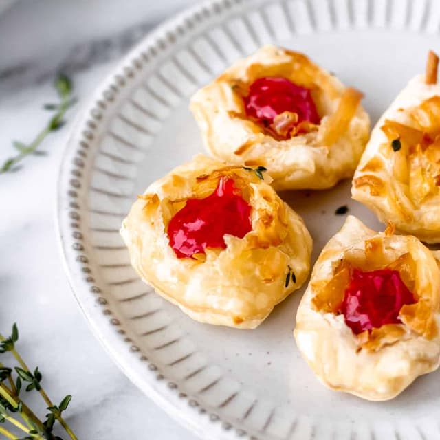 Savory Gruyere Cheese Puffs with Raspberry Sauce Punchfork