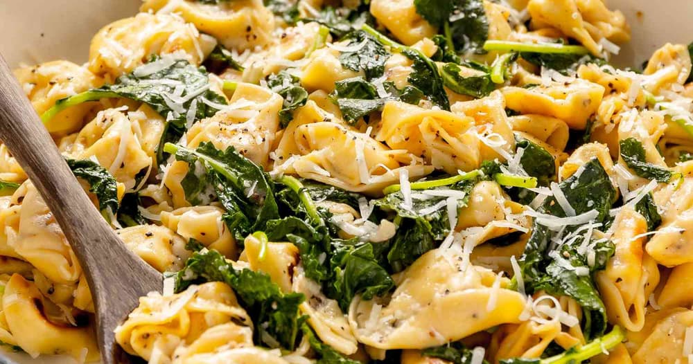 Skillet Cacio e Pepe Tortellini with Wilted Greens Punchfork