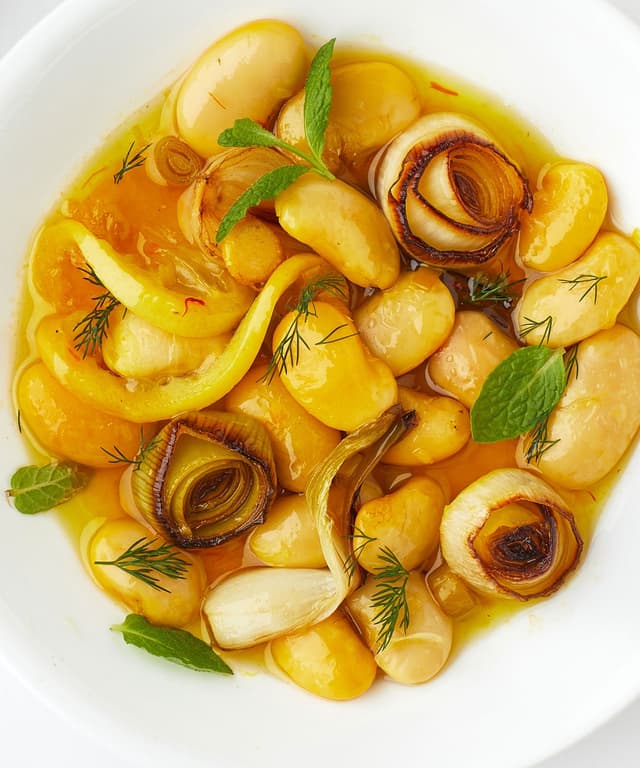 Bean Confit with Lemon, Saffron, and All the Alliums Punchfork