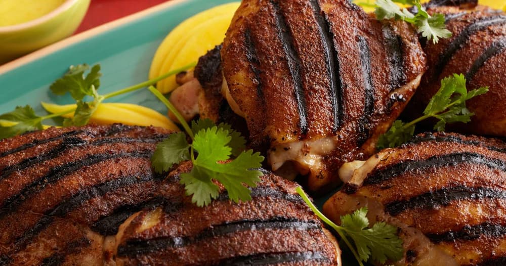 Jerk Rubbed Chicken Thighs with HomeMade MangoHabanero Hot Sauce Punchfork