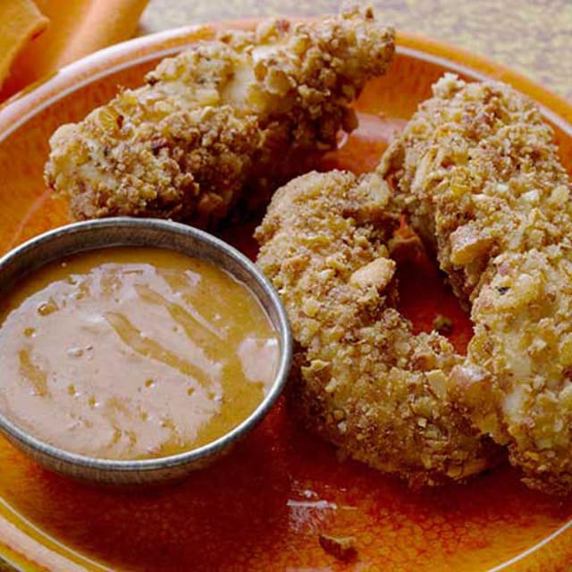 Awesome Pretzel Chicken Tenders with Spicy Honey Dijon Sauce Punchfork