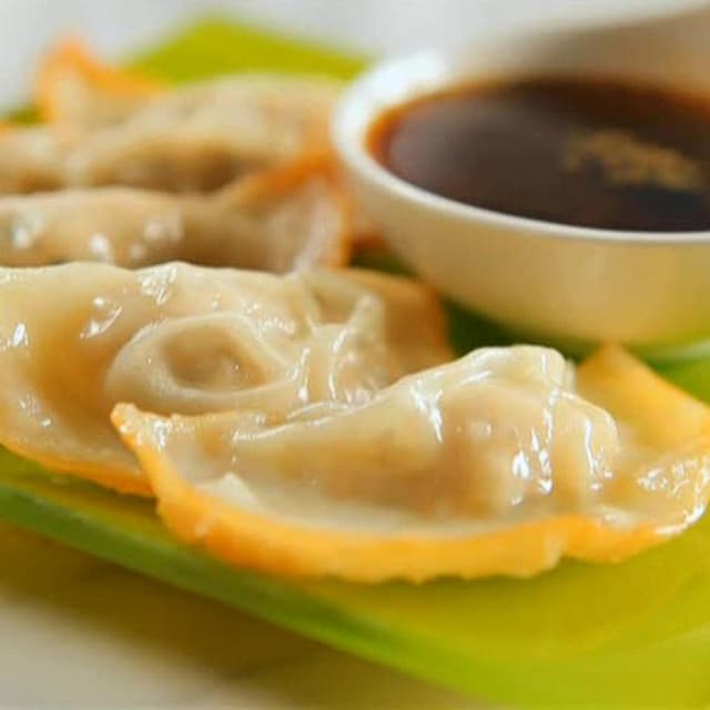 PanFried Chicken Dumplings with Sweet and Spicy Dipping Sauce Punchfork