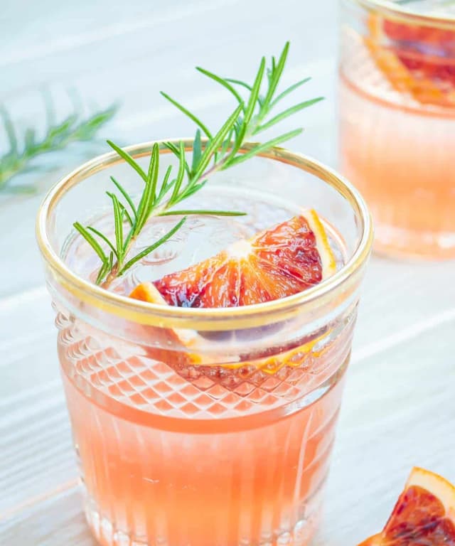 Blood Orange Cocktail with Vodka and Rosemary Punchfork