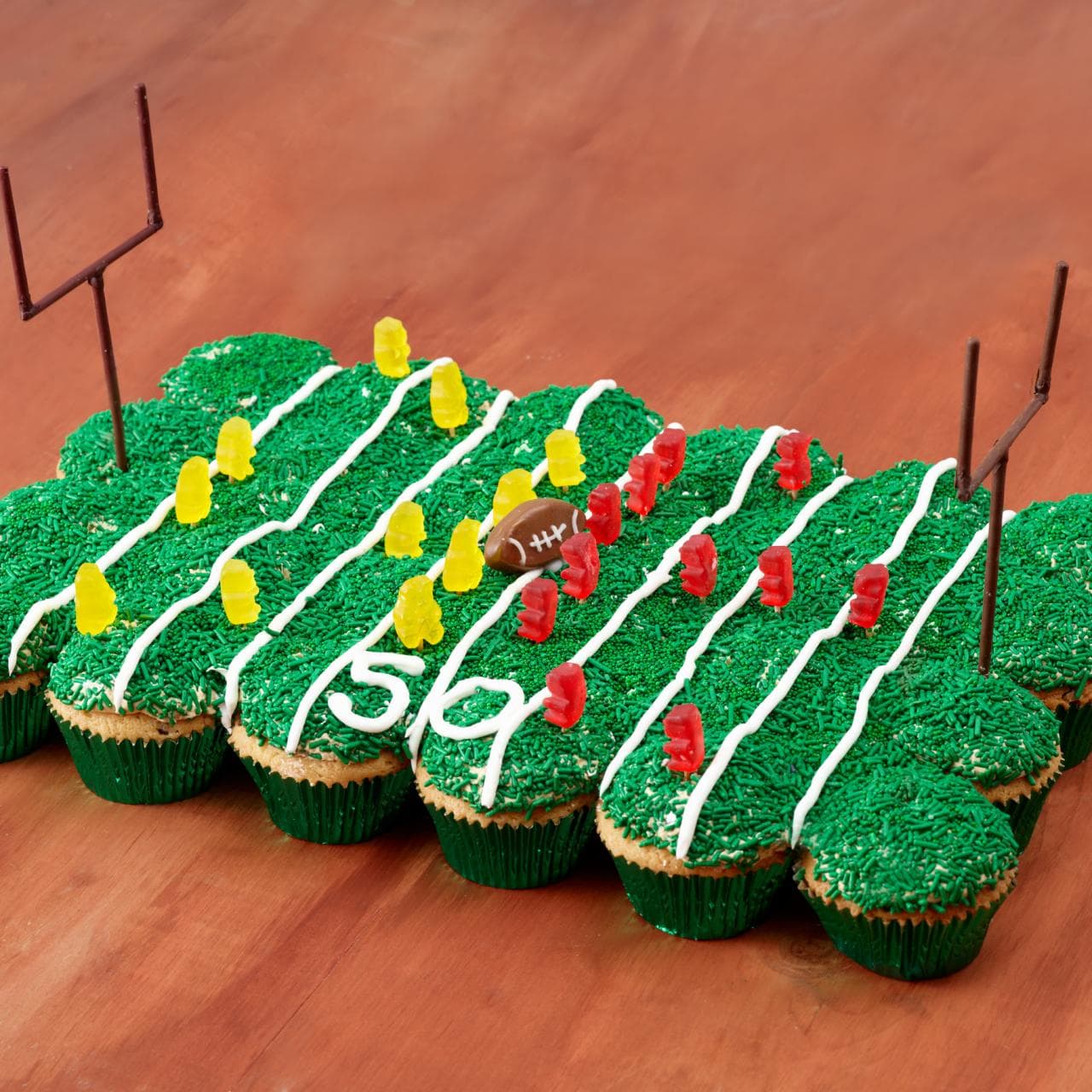 touchdown cupcake game day football themed green grass frosting field goal post cupcake easy