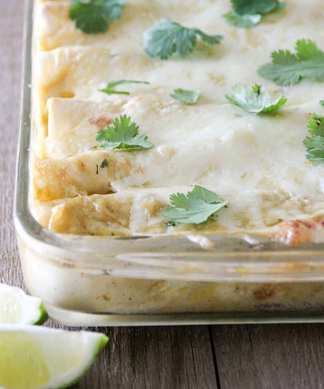 Chicken, Black Bean & Zucchini Enchiladas with Creamy Green Chile Sauce