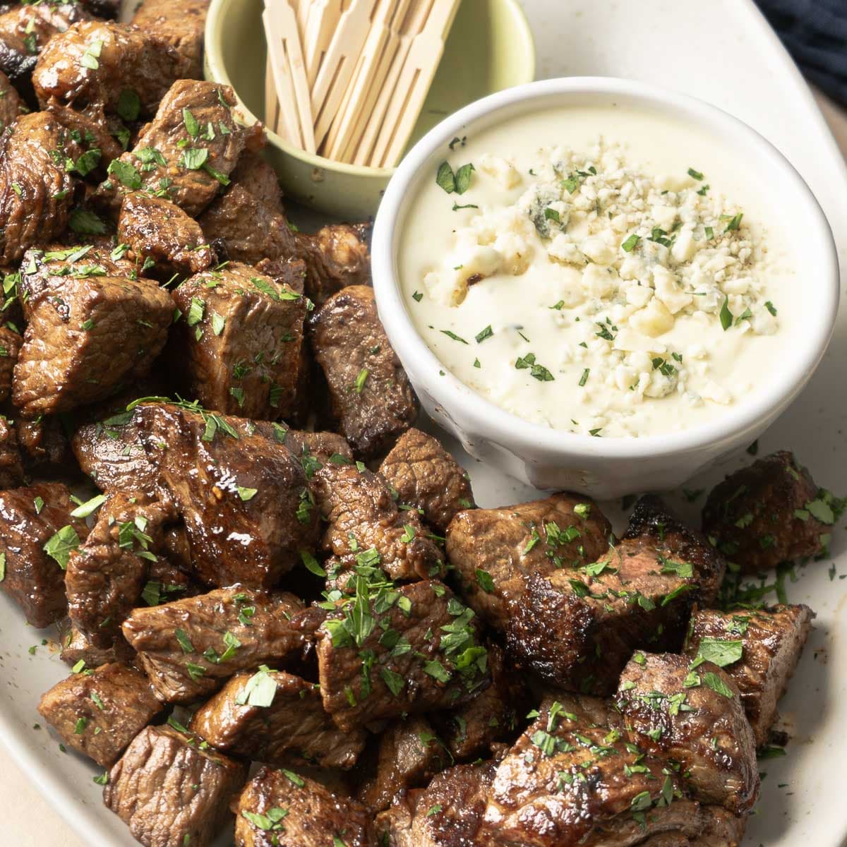 Steak Bites Appetizer with Blue Cheese Sauce Punchfork