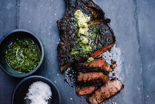Grilled Tomahawk Steak with Chimichurri Compound Butter | Punchfork