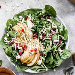 pomegranate and pear green salad with ginger dressing Pomegranate & Pear Green Salad with Ginger Dressing