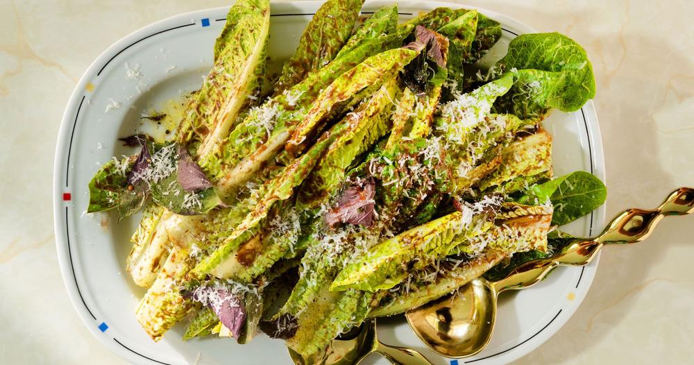 black garlic caesar dressing SOB - SOB Black Caesar Salad: creamy house-made black garlic Caesar dressing, romaine & black kale, black pumpernickel croutons, and crispy parm wheel